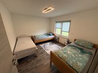 Wohnung 1: Schlafzimmer mit 3 Einzelbetten Wohnung 1: Schlafzimmer mit 3 Einzelbetten