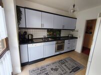 Eine voll ausgestattete Küche Eine voll ausgestattete Küche