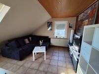 Wohnbereich mit ausziehbaren Schlafcouch Wohnbereich mit ausziehbaren Schlafcouch