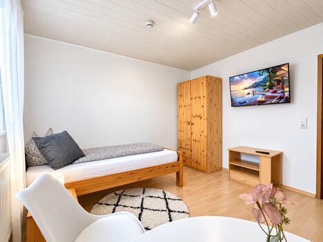 Schlafzimmer mit Smart TV Schlafzimmer mit Smart TV