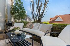 Terrassen mit Grills und Sitzbereichen Terrassen mit Grills und Sitzbereichen