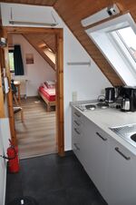 Schöne DG-Wohnung mit Gartensitzplatz Bild 3 Schöne DG-Wohnung mit Gartensitzplatz Bild 3