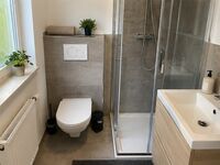 Badezimmer mit Waschmaschine Badezimmer mit Waschmaschine