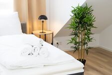 Schlafzimmer 2 mit einem Doppelbett Schlafzimmer 2 mit einem Doppelbett
