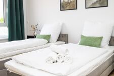 Schlafzimmer 1 mit 2 Einzelbetten oder einem Doppelbett Schlafzimmer 1 mit 2 Einzelbetten oder einem Doppelbett