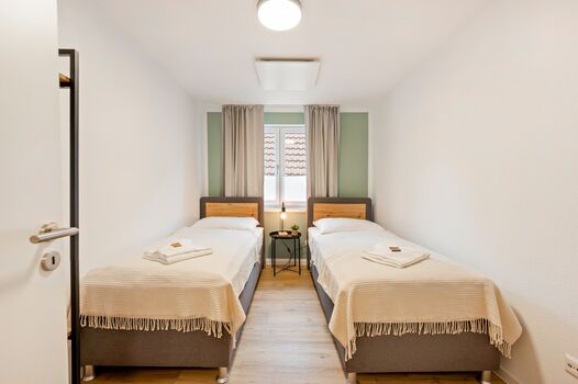 Schlafzimmer mit zwei Einzelbetten Schlafzimmer mit zwei Einzelbetten