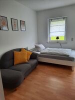 Wohnung 1, Schlafraum mit einem Bett Wohnung 1, Schlafraum mit einem Bett