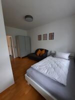 Wohnung 1, Schlafraum mit einem Bett Wohnung 1, Schlafraum mit einem Bett