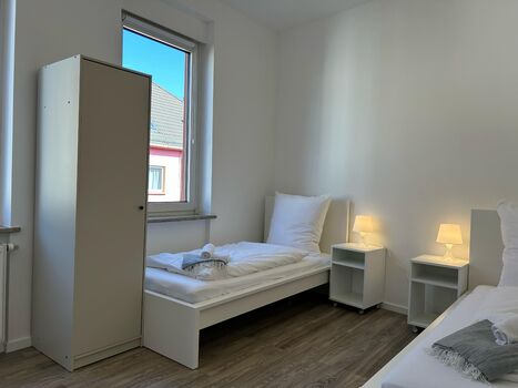 Modernes Apartment mit 3 Einzelbetten & Waschmaschine Modernes Apartment mit 3 Einzelbetten & Waschmaschine