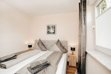 Schlafzimmer mit Doppelbett Schlafzimmer mit Doppelbett