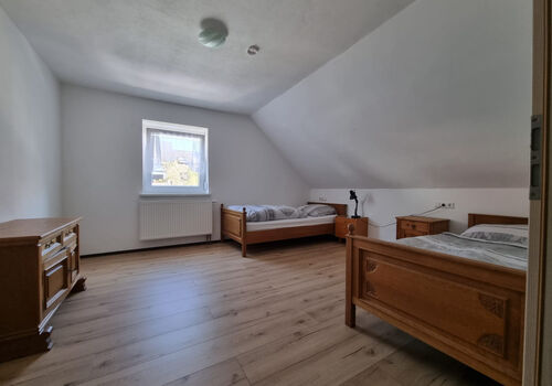 Schlafzimmer mit 2 Betten Schlafzimmer mit 2 Betten