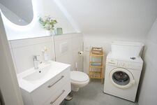 Zusätzliches WC mit Waschmaschine