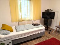 gelbes Zimmer, 2 Einzelbetten, TV