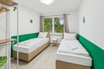 Schlafzimmer mit 2 Hotelbetten
