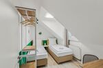 Schlafzimmer mit 2 Hotelbetten
