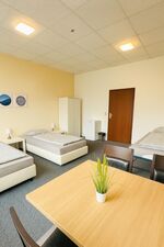 35 Zimmer (EZ/DZ) & 15 Apartments | WLAN | Küche | Zentrale Lage | Ruhig Bild 1