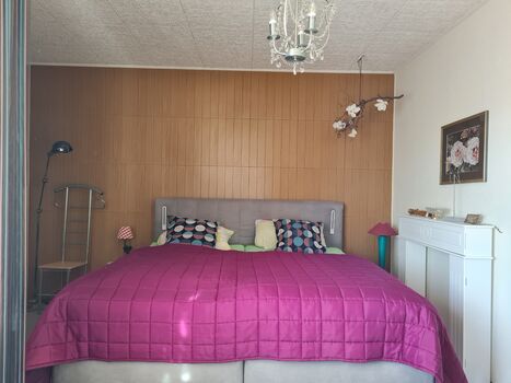 Schlafzimmer 1. Obergeschoss mit Zugang Balkon