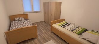 Zwei Häuser - Wohnungen Zimmer zu Vermieten Bild 11