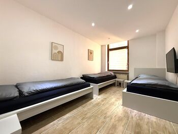 Zimmer 3 Einzelbetten 90x200 cm