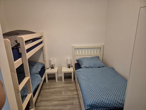 Schlafnische mit Etagen- und Einzelbett