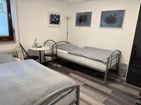 Doppelzimmer mit getrennten Betten