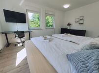 Smart-TV und Arbeitsplatz inkl.