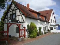 Die Pension von Parkplatz aus gesehen.