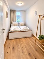 Einzelzimmer mit Queensize Bett