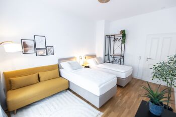 Separate Einzelbetten für ungestörte Ruhe und erholsamen Schlaf.