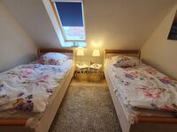 Doppelzimmer mit getrennten Betten