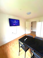 Esszimmer mit Fernseher