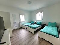 Schlafzimmer (2 oder 3 Einzelbetten)