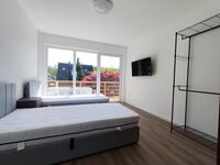 Schlafzimmer mit Balkon