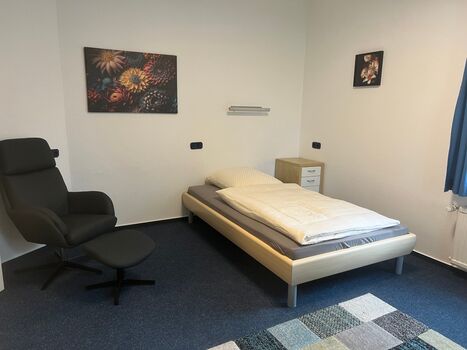 Bett im 1-Raumappartement Landhausvilla, Knickwall 2