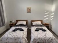Schlafzimmer mit 2 Einzelbetten - Apartment 1