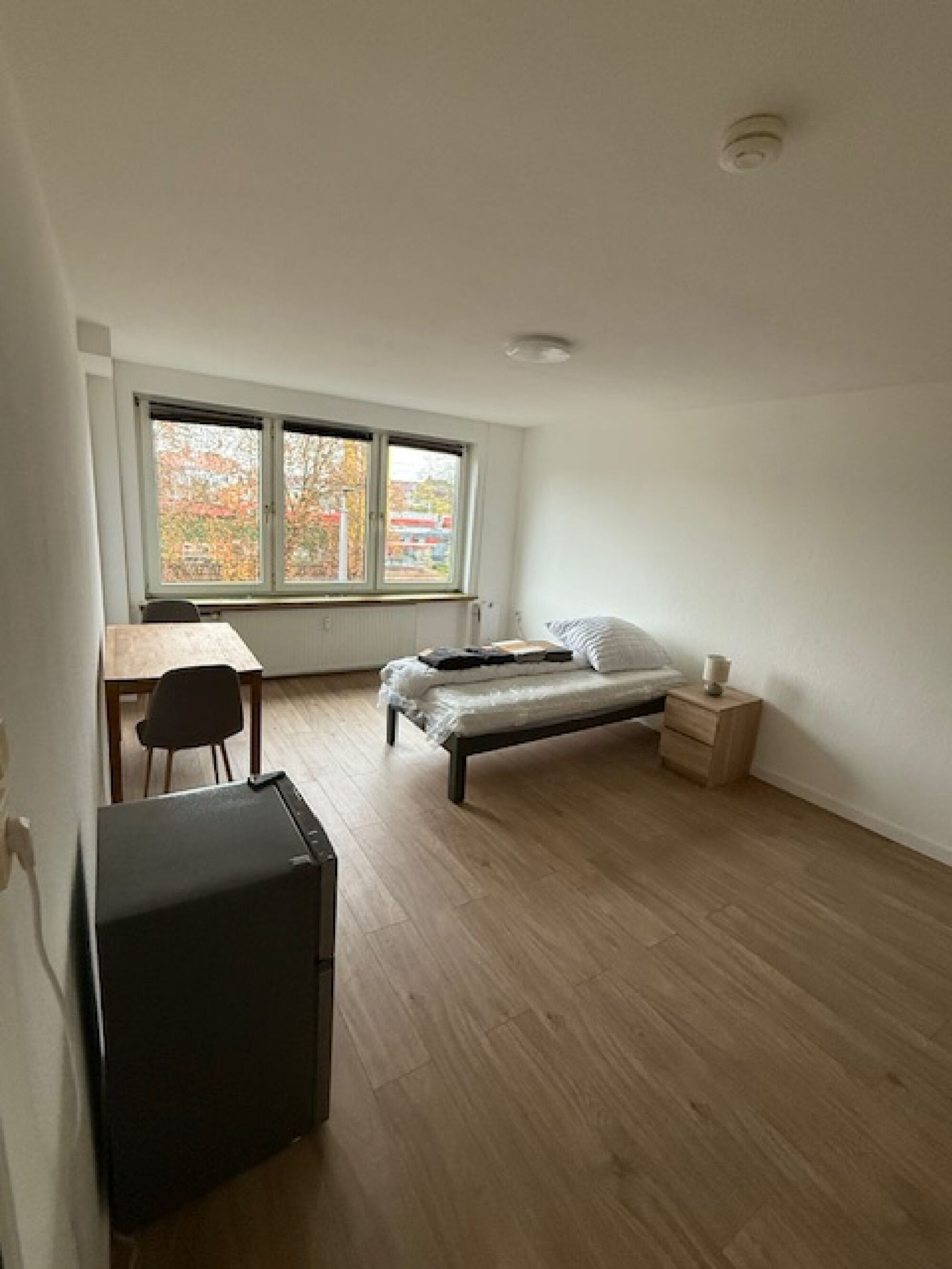 Einzelzimmer mit Kühlschrank