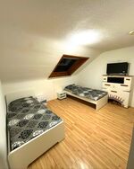 Schlafzimmer mit Einzelbetten