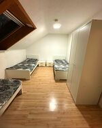 Schlafzimmer mit Einzelbetten