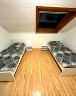 Schlafzimmer mit Einzelbetten