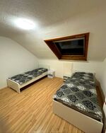 Schlafzimmer mit Einzelbetten